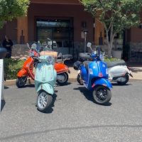 New and vintage Vespas on the road